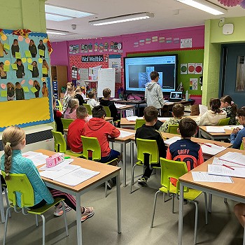 Pupils engaged in group learning activity