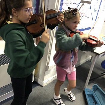 children playing violins