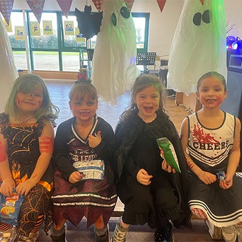 Four girls enjoying their time in their halloween disco