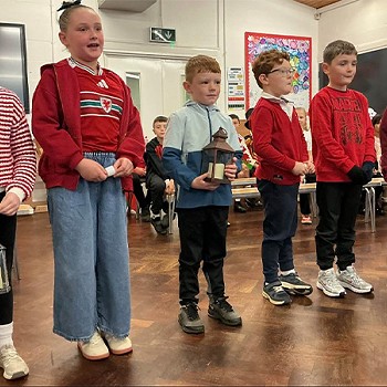 Children from year 3 and 4 taking part in an assembly