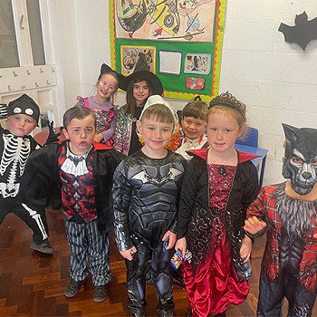 Year 1 and 2 children have dressed up as difference characters for their halloween disco