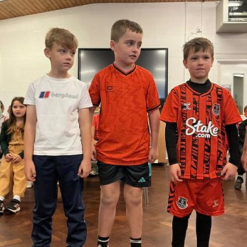 Children taking part in an acting scene in the assembly